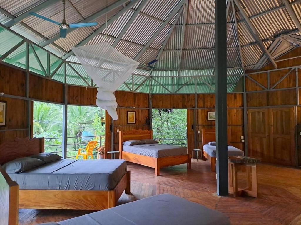 Un ou plusieurs lits dans un hébergement de l'établissement La Amapola Lodge, Bungalow en Península de Osa.