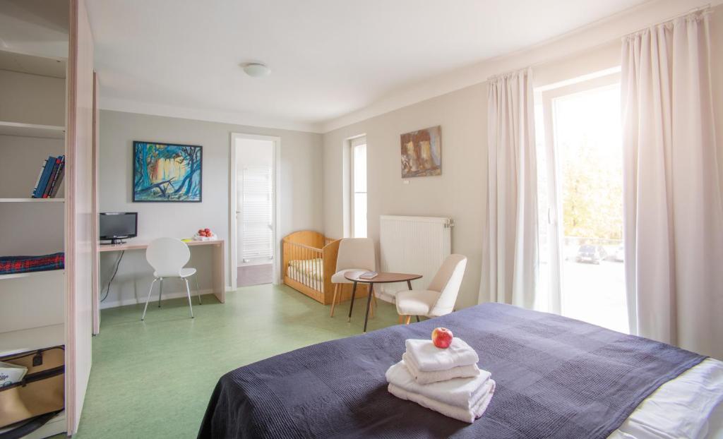 Postel nebo postele na pokoji v ubytování veloInn Hotel Bad Berka im Weimarer Land