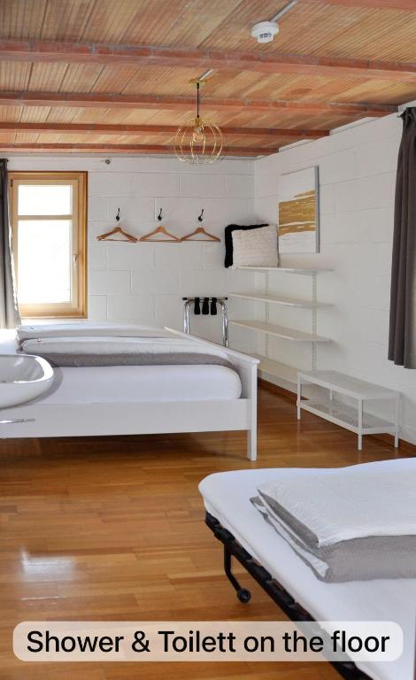 Postel nebo postele na pokoji v ubytování BnB SchlafSchloss