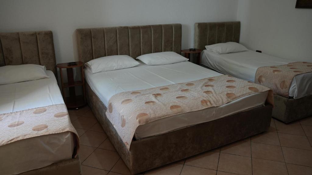 Postel nebo postele na pokoji v ubytování Alen Bar Hotel