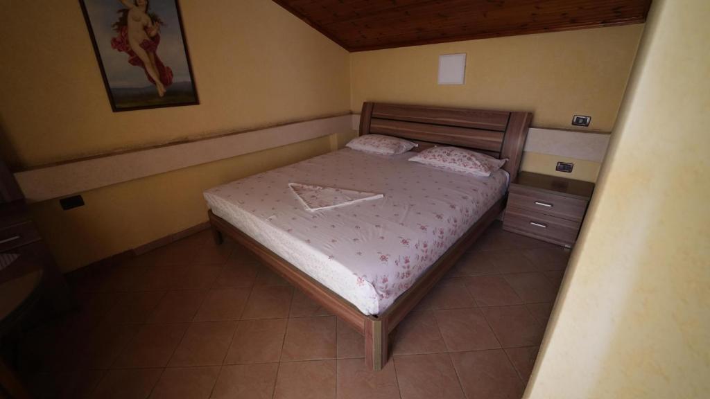 Postel nebo postele na pokoji v ubytování Alen Bar Hotel
