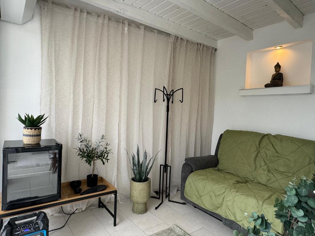 Televízia a/alebo spoločenská miestnosť v ubytovaní Borbara Apartman