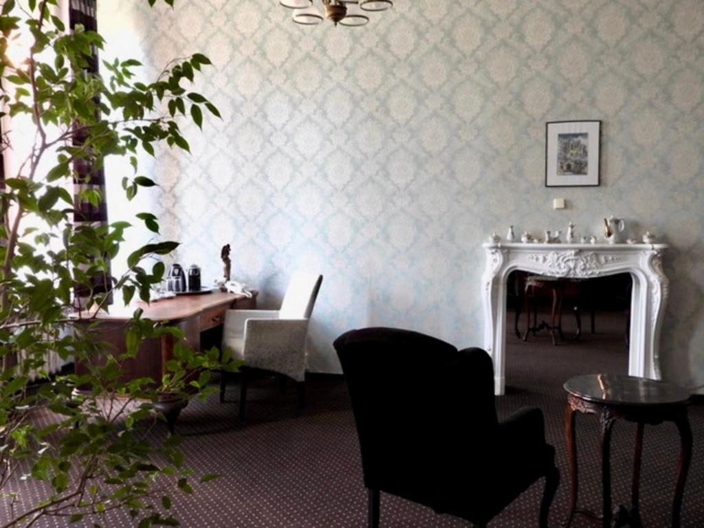 
The Karge Suite with king-size bed, balcony and open bathroom
