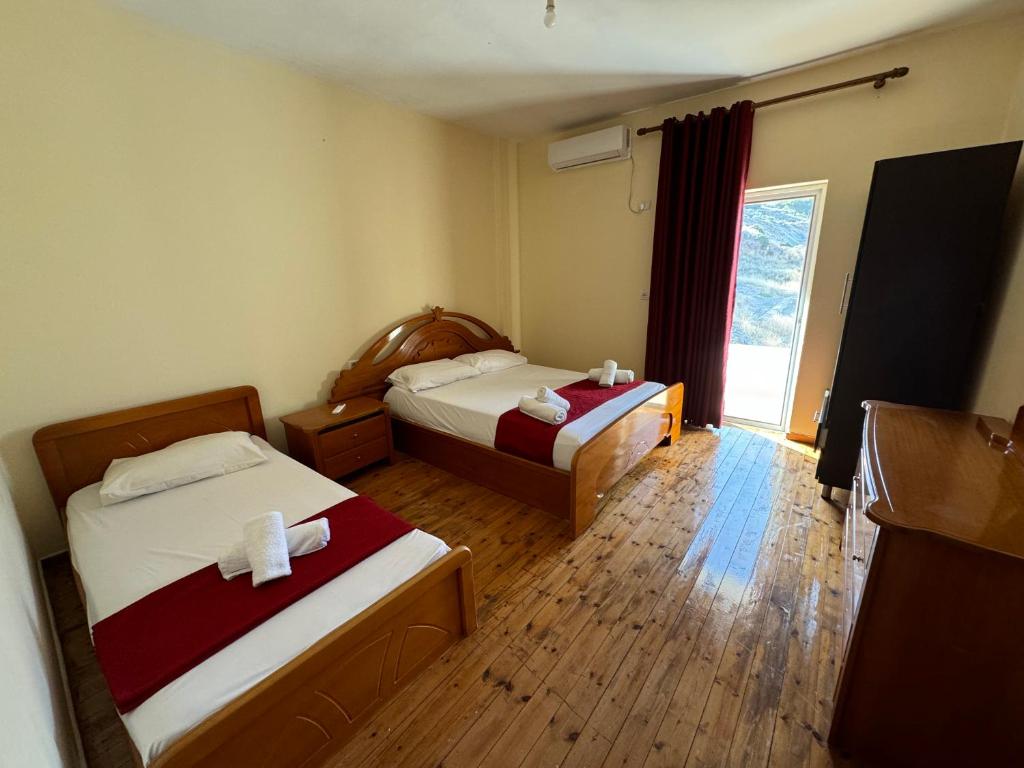 Letto o letti in una camera di Guesthouse Kleanth