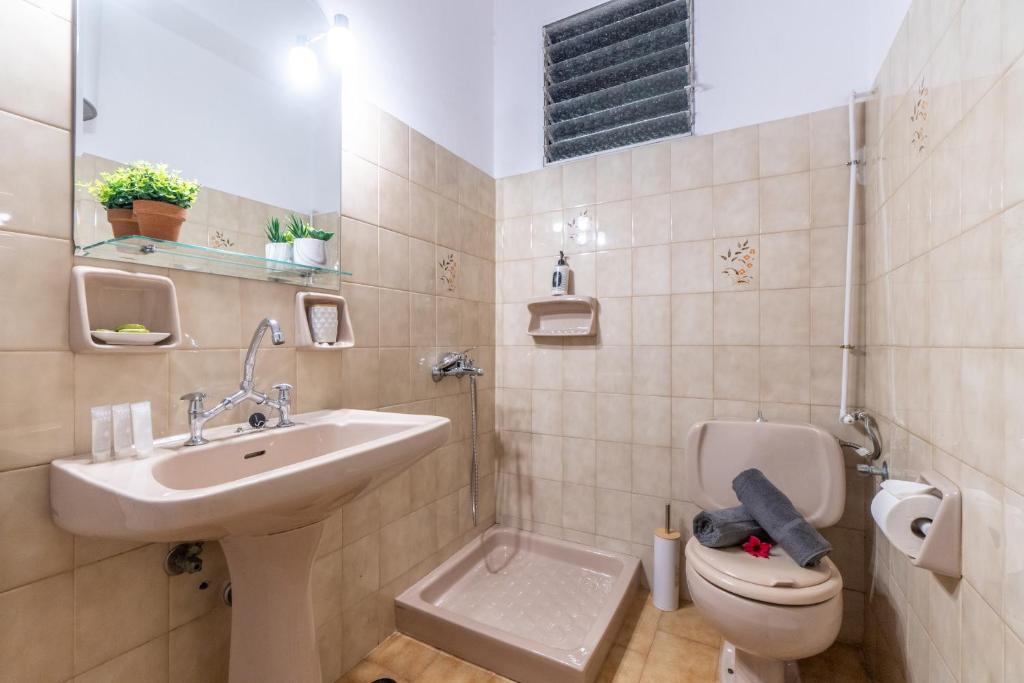 Koupelna v ubytování Maestro Apartment