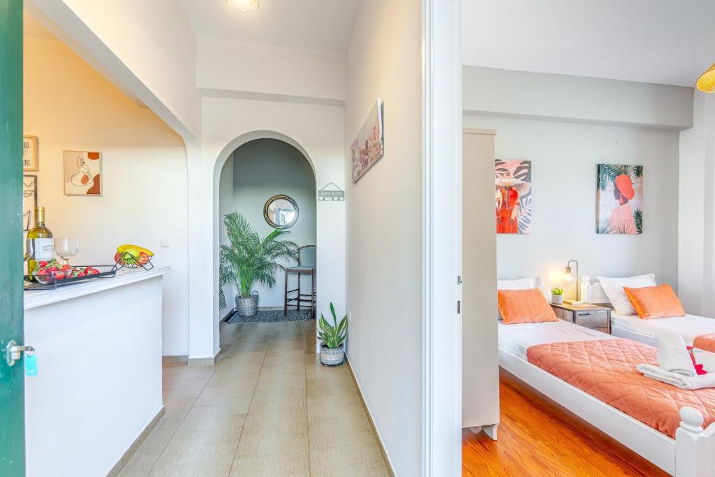 Postel nebo postele na pokoji v ubytování Maestro Apartment