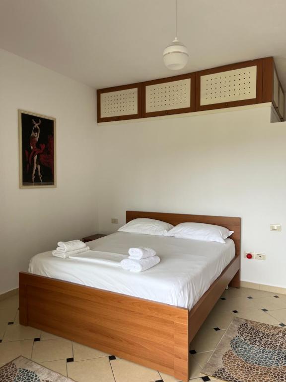 Postel nebo postele na pokoji v ubytování Rei’s place