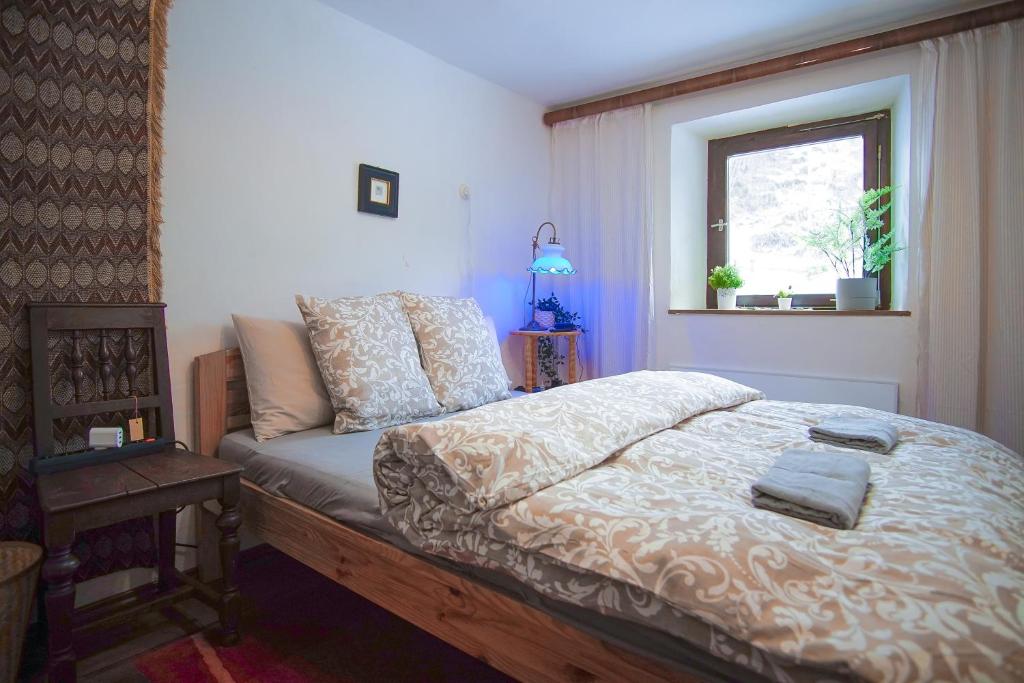 Postel nebo postele na pokoji v ubytování Elventhal - Private Chalet in alpine valley