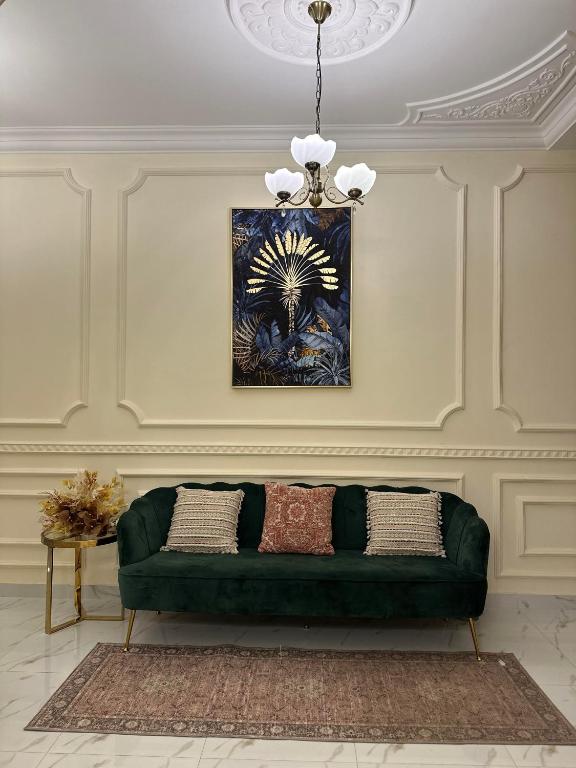 Posezení v ubytování فيلا المزار villa almazar