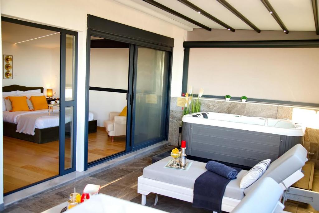 Ένα ή περισσότερα κρεβάτια σε δωμάτιο στο Alex Suite with private jacuzzi