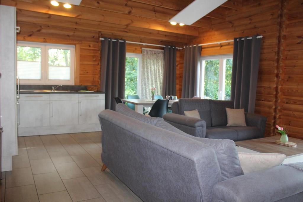 Posezení v ubytování Ferienhaus Harmonie, Sauna,Seeblick, familienfreundlich