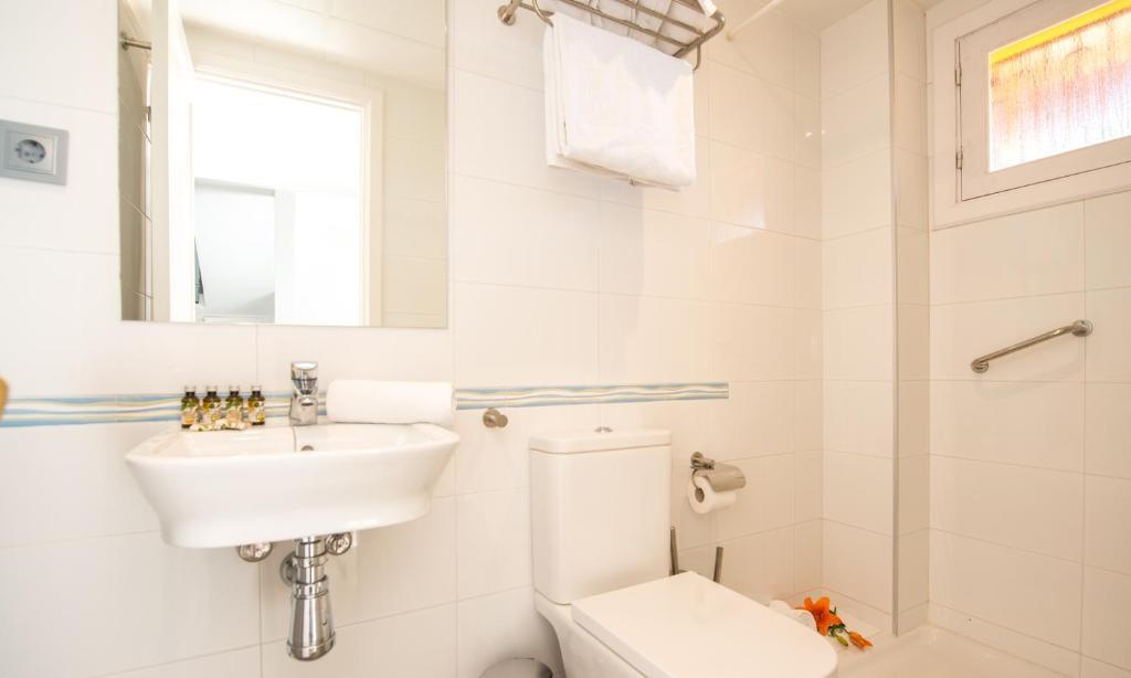 Ванная комната в Aparthotel Ona Aucanada