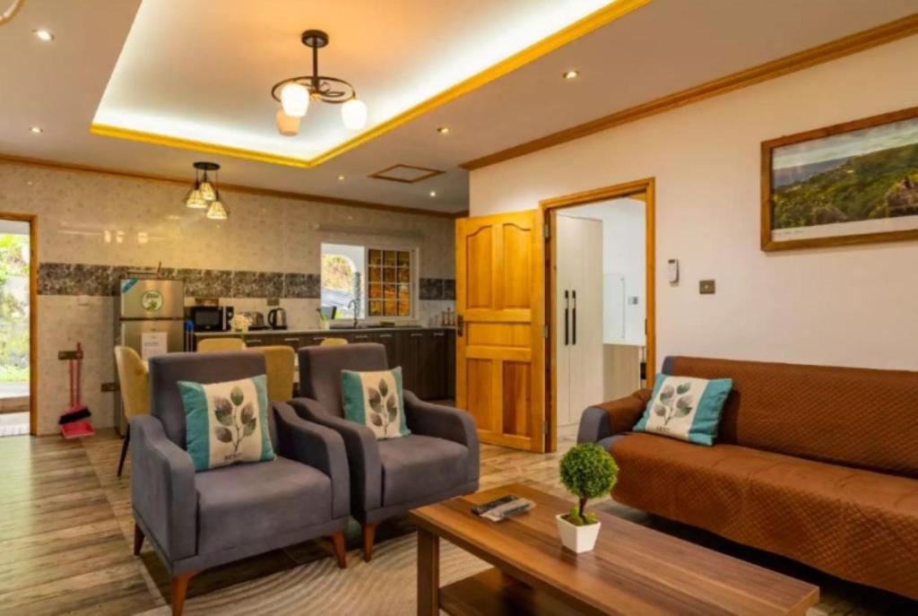 Kuchyň nebo kuchyňský kout v ubytování Paradise Breeze Apartment
