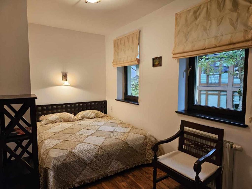 Posteľ alebo postele v izbe v ubytovaní Apart4You Apartamenty Bulwary25