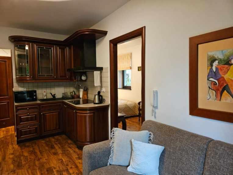 Kuchyňa alebo kuchynka v ubytovaní Apart4You Apartamenty Bulwary25