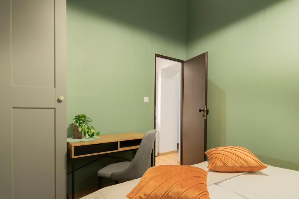 Posteľ alebo postele v izbe v ubytovaní Apartments Studencka Street, Next to Planty Park