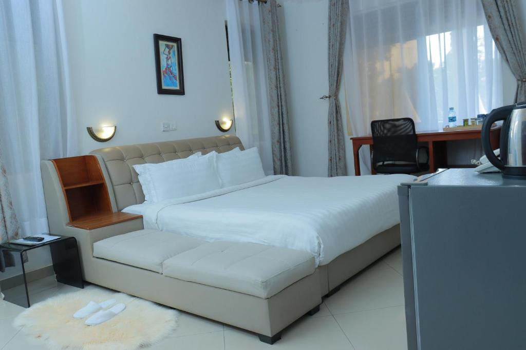 Postel nebo postele na pokoji v ubytování Mowicribs Hotel and Spa