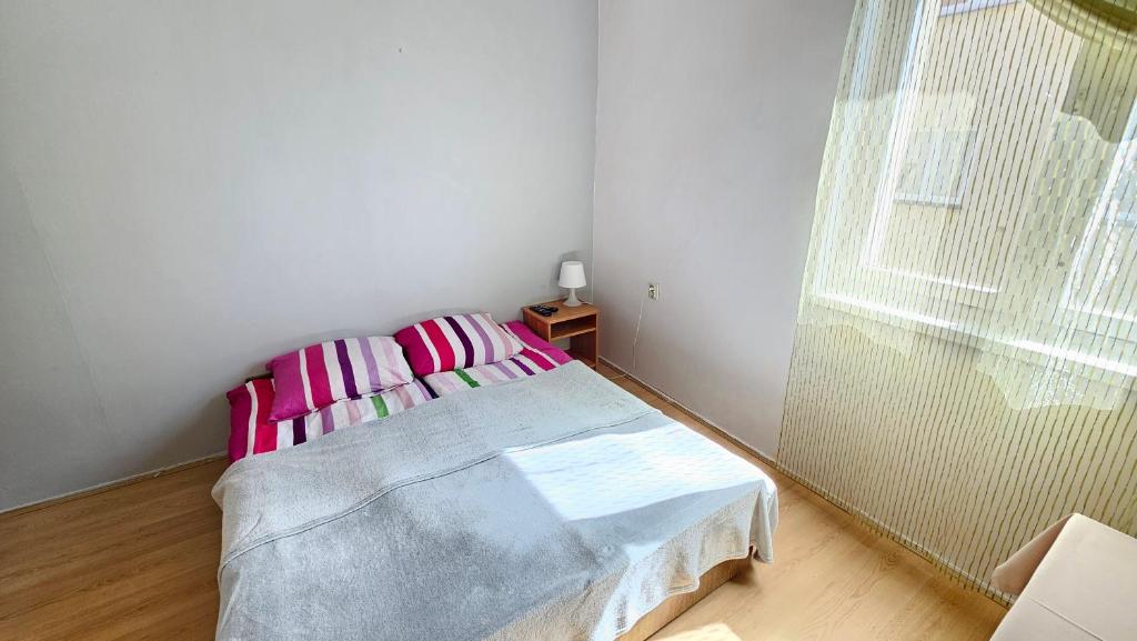 Łóżko lub łóżka w pokoju w obiekcie Willa Daniela