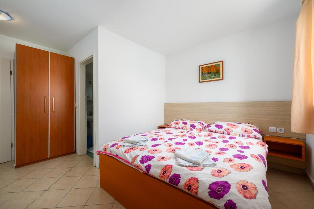 Postel nebo postele na pokoji v ubytování Ven Apartmani