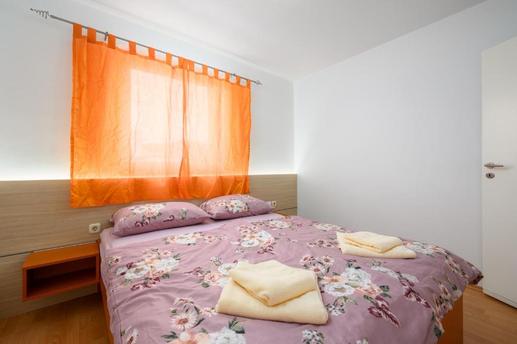 Postel nebo postele na pokoji v ubytování Ven Apartmani
