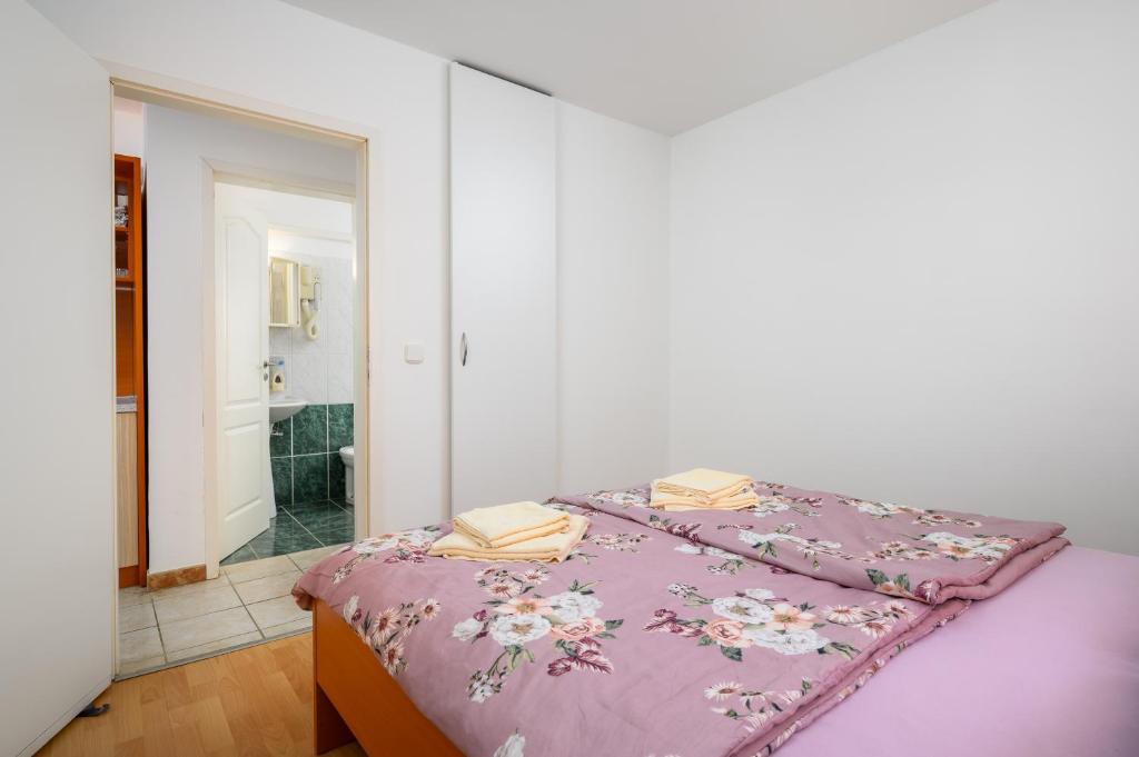Postel nebo postele na pokoji v ubytování Ven Apartmani