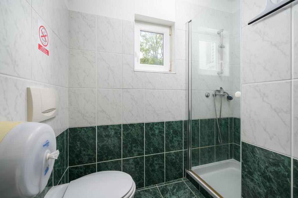 Koupelna v ubytování Ven Apartmani