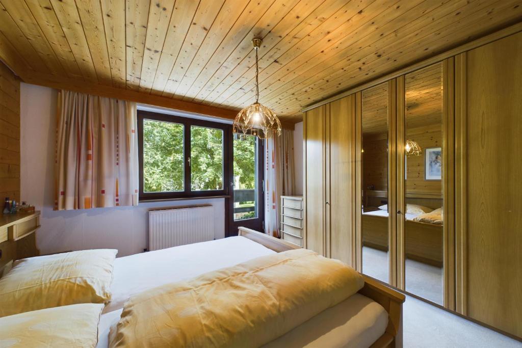 Postel nebo postele na pokoji v ubytování Peak View Appartements