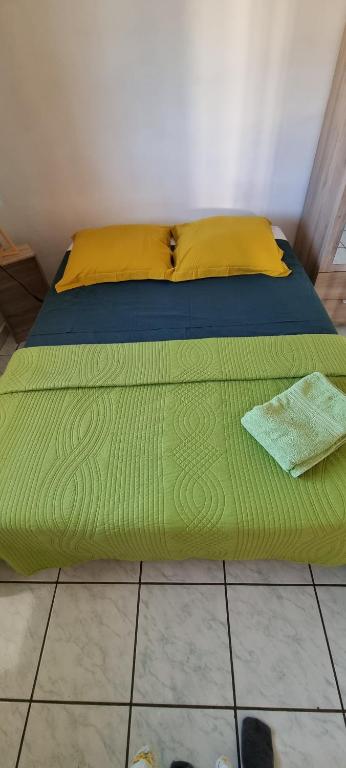 Postel nebo postele na pokoji v ubytování CHEZ LILIANE