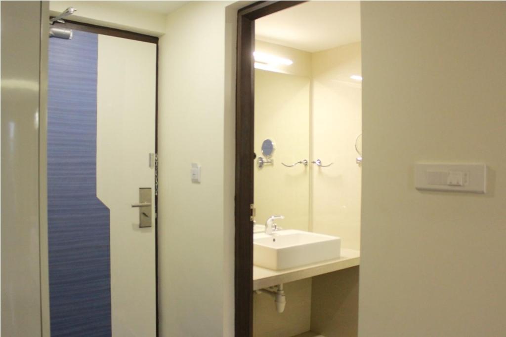 Koupelna v ubytování Hotel Vijay Elanza