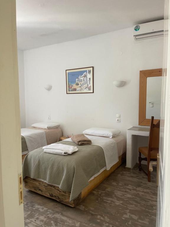Łóżko lub łóżka w pokoju w obiekcie Venereum Apartments