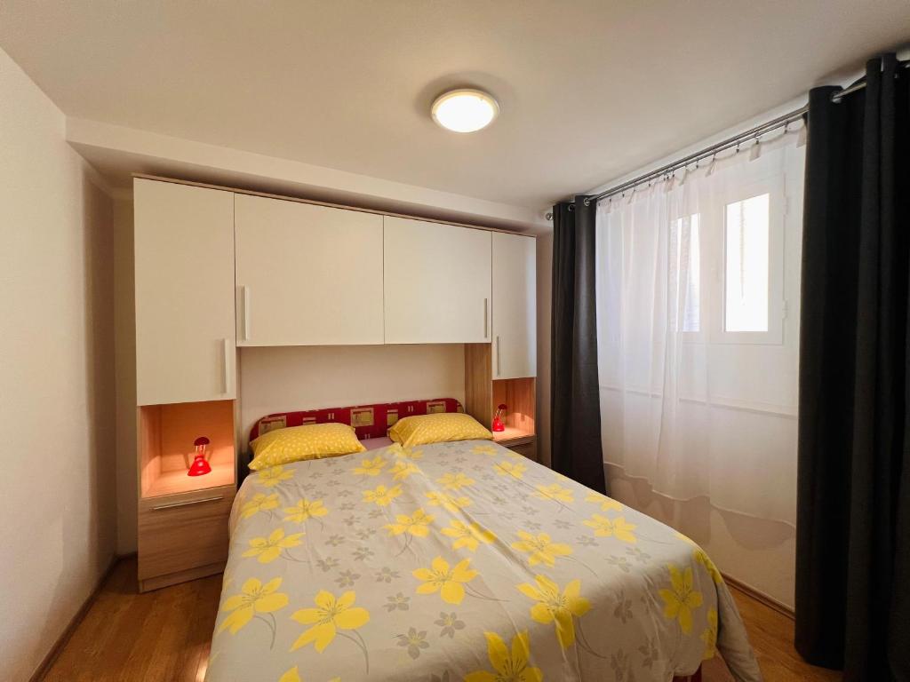 Posteľ alebo postele v izbe v ubytovaní Apartman Gabriela Mali Lošinj