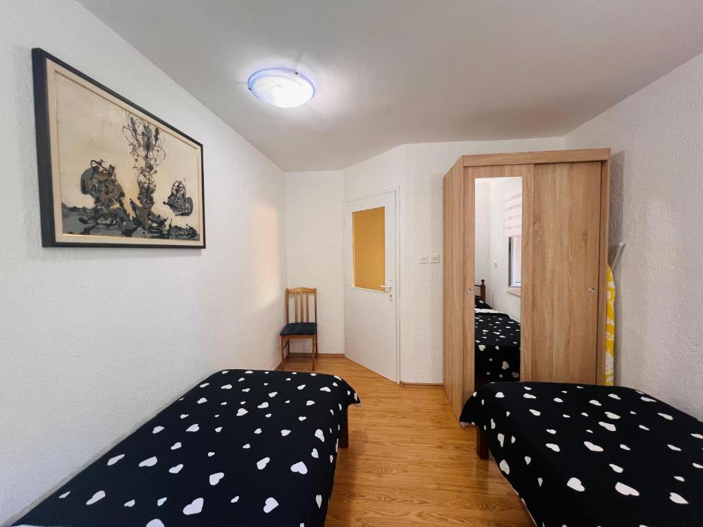 Posteľ alebo postele v izbe v ubytovaní Apartman Gabriela Mali Lošinj