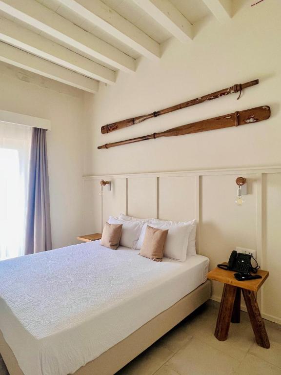 Postel nebo postele na pokoji v ubytování Palazzo Matà Boutique Hotel