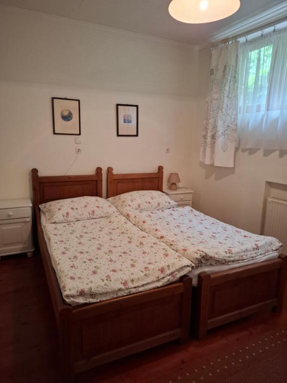 Postel nebo postele na pokoji v ubytování Agyagos Vendégház