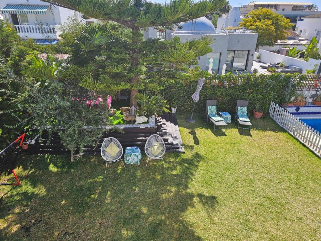 Zahrada ubytování Andalusian Delight Family Villa with 3 bedrooms with Amazing mountains Views