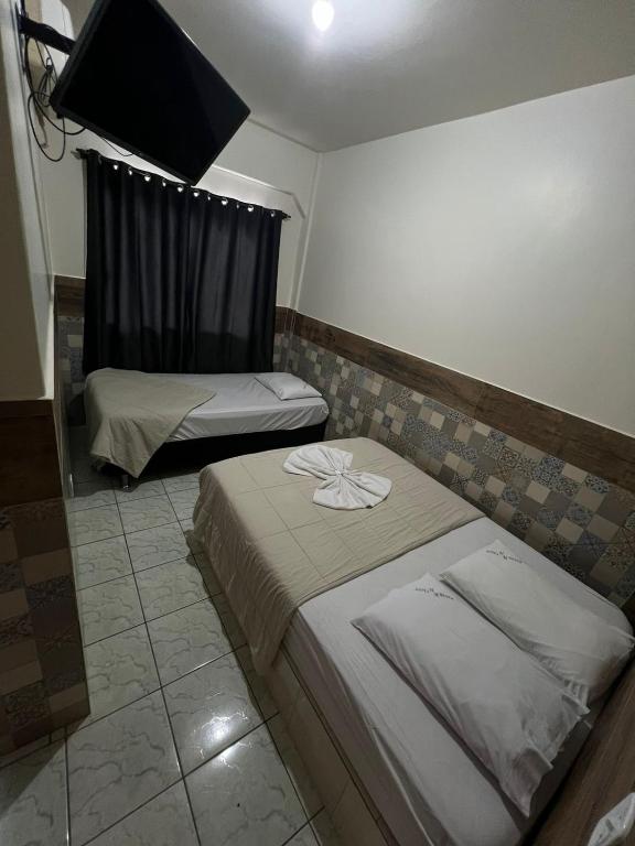 Postel nebo postele na pokoji v ubytování Hotel Meyer