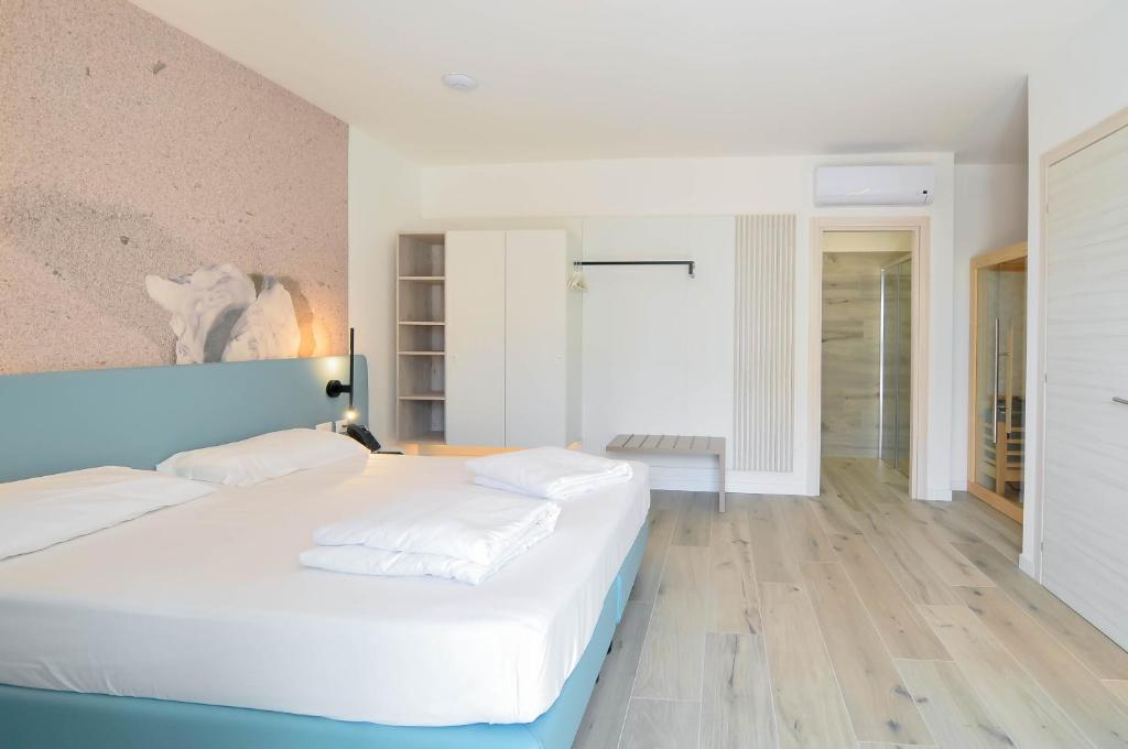 Postel nebo postele na pokoji v ubytování Marina Palace Hotel 4 stelle S