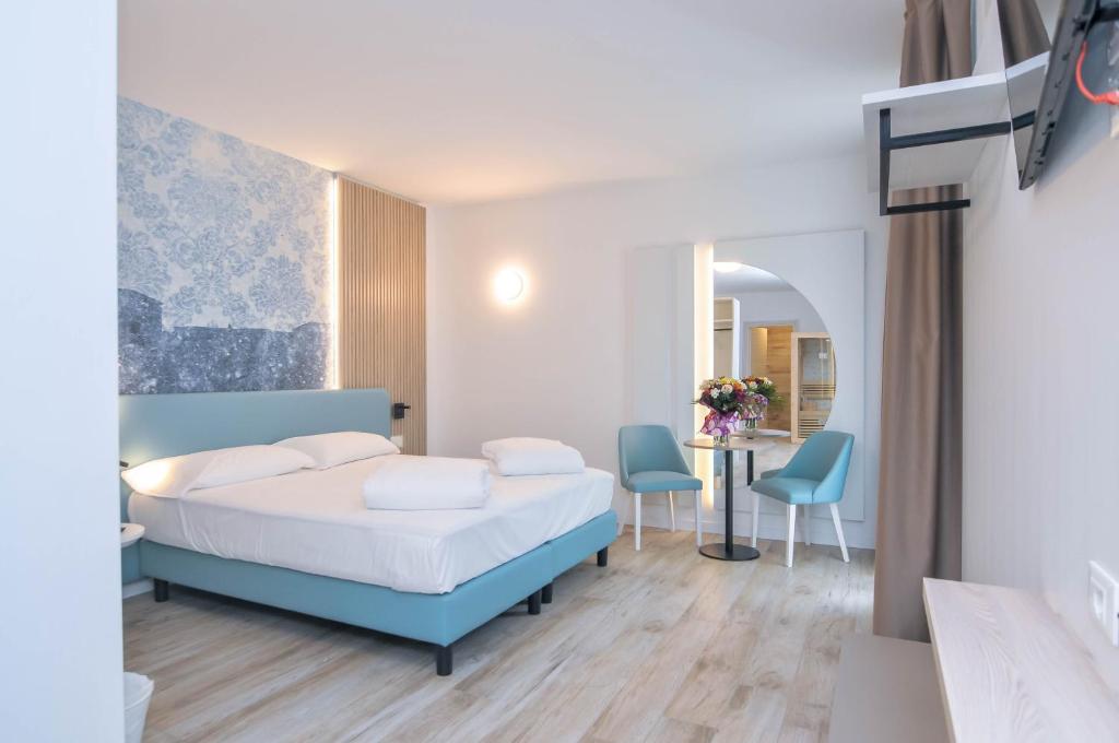 Postel nebo postele na pokoji v ubytování Marina Palace Hotel 4 stelle S
