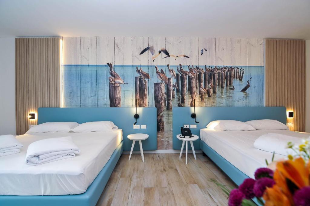 Postel nebo postele na pokoji v ubytování Marina Palace Hotel 4 stelle S