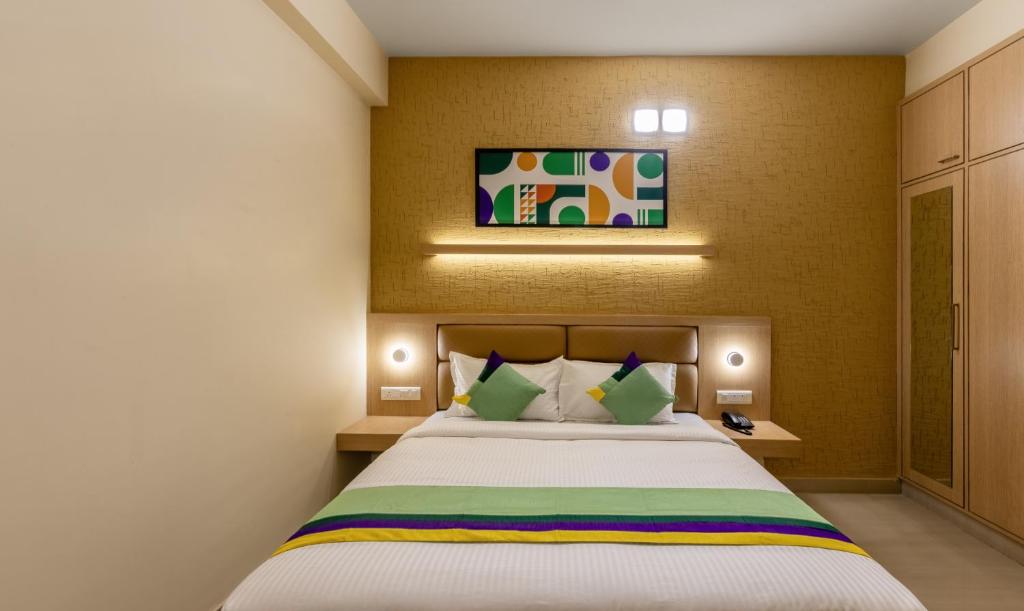 Postel nebo postele na pokoji v ubytování Treebo Nestlay Rooms, Nungambakkam