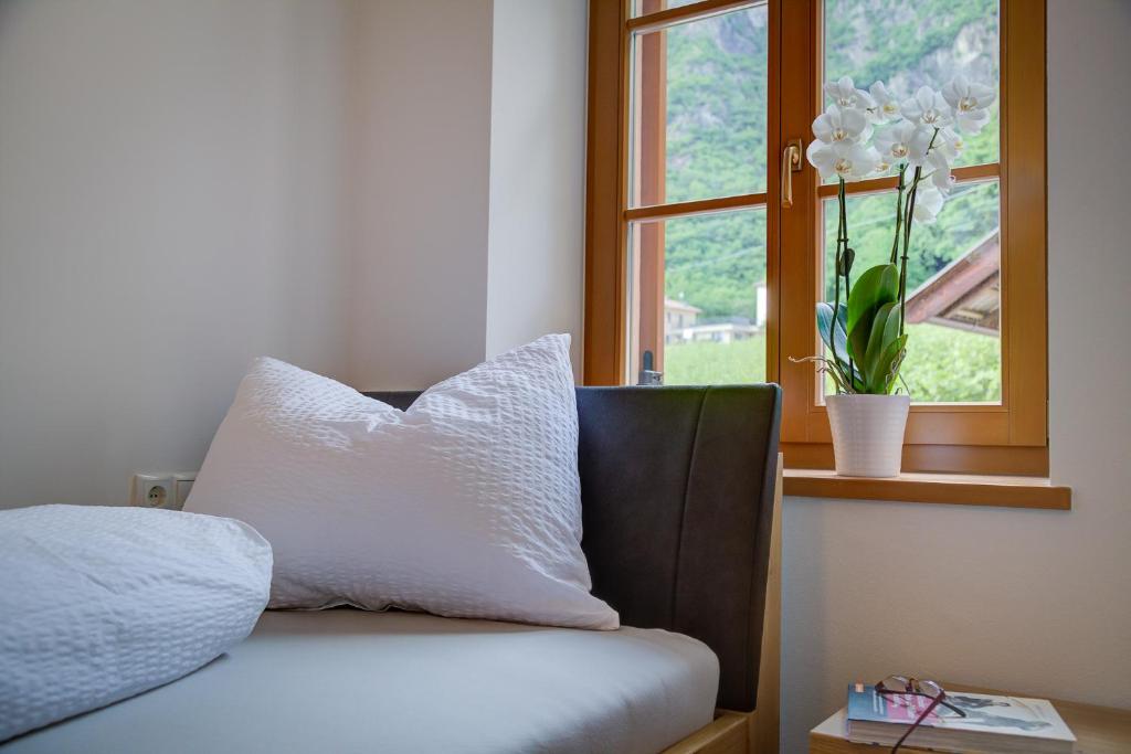 Postel nebo postele na pokoji v ubytování Linslhof Apt Quarz