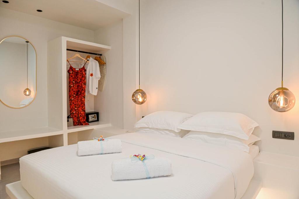 Llit o llits en una habitació de Omnia Suite