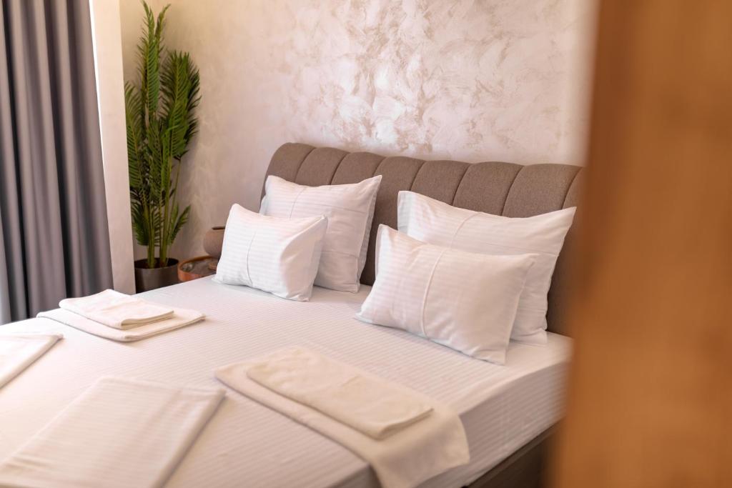 Postel nebo postele na pokoji v ubytování Baba's Hotel & Spa