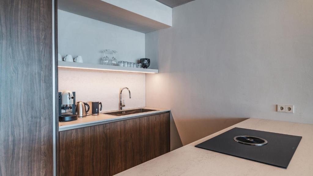 Kuchyň nebo kuchyňský kout v ubytování Arua Private Spa Villas