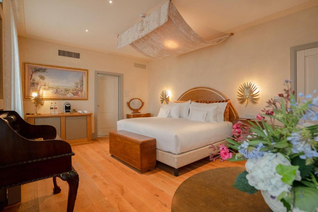 Postel nebo postele na pokoji v ubytování La Monastica Resort & Spa