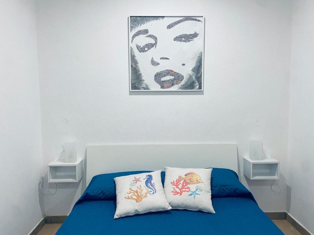 Postel nebo postele na pokoji v ubytování Al Mare Fuori