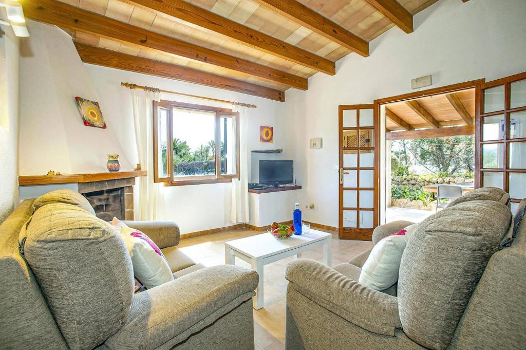 Televízia a/alebo spoločenská miestnosť v ubytovaní Villa Venancio by Villa Plus
