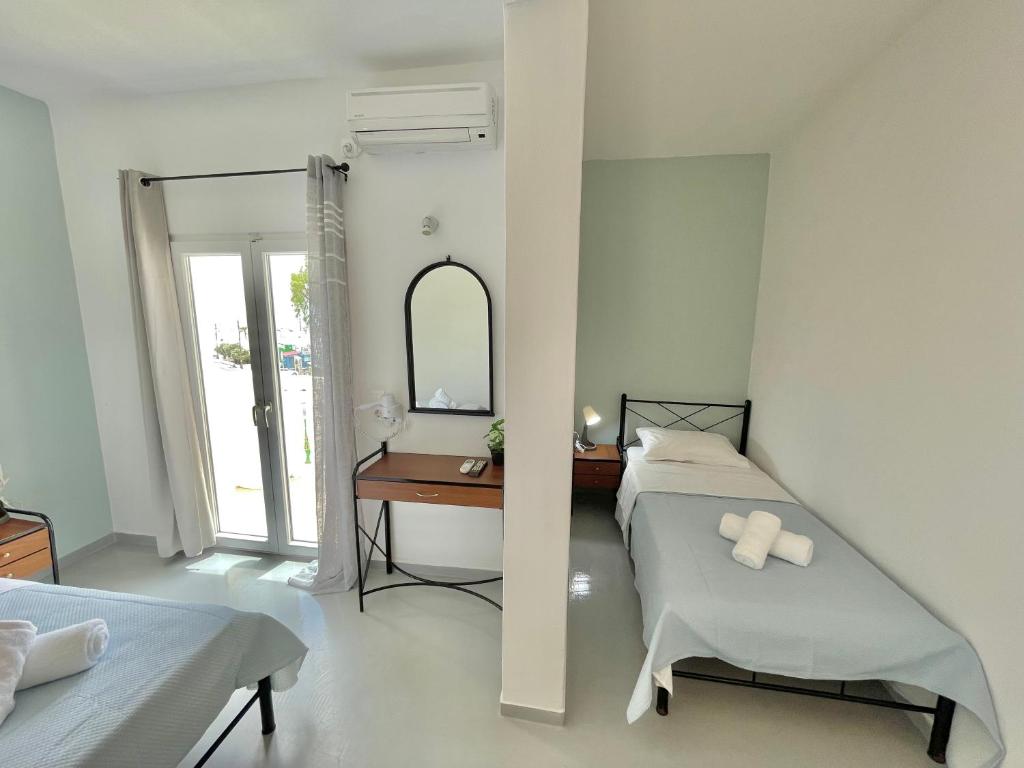 Postel nebo postele na pokoji v ubytování SunDreams rooms