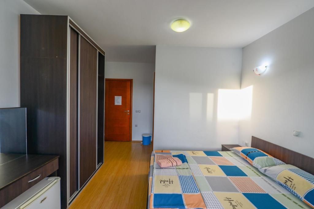 Postel nebo postele na pokoji v ubytování Rexha Apartments