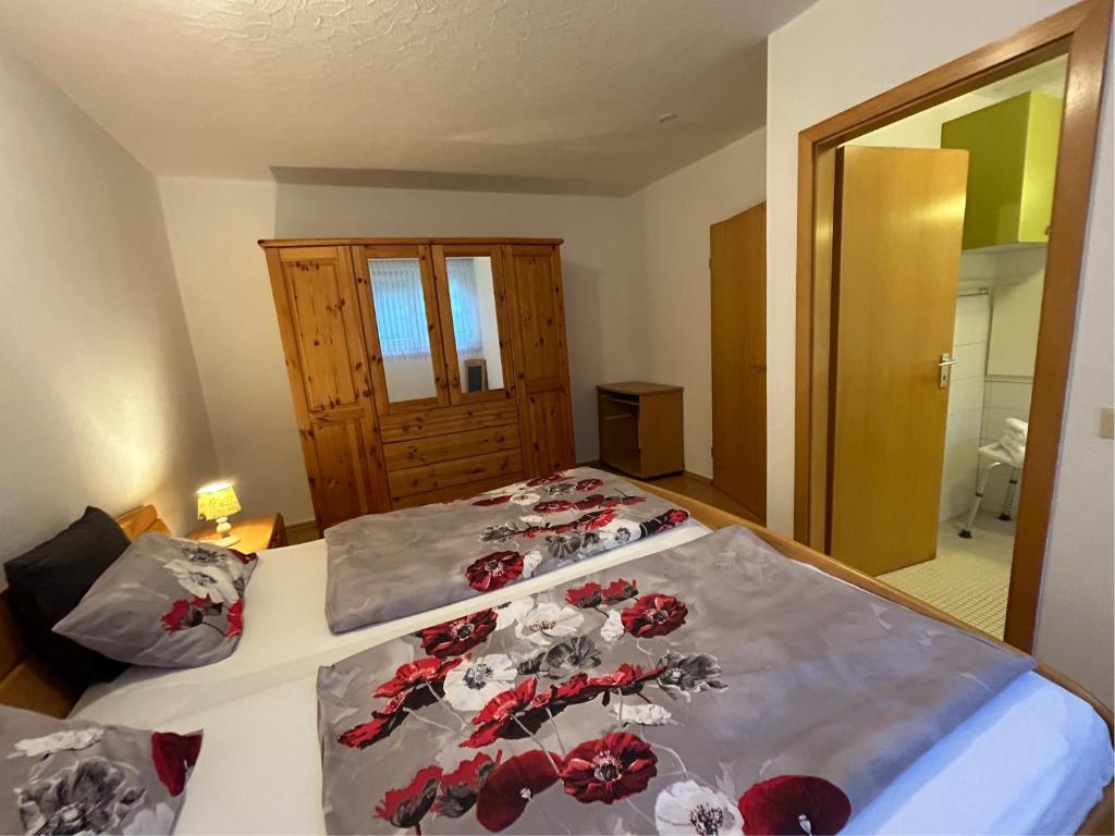 Postel nebo postele na pokoji v ubytování Haus Wegener